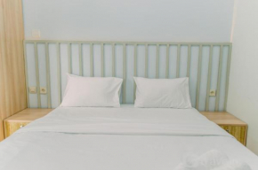 Nice and Simply Studio at Amazana Serpong Apartment By Travelio